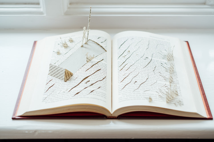Paper Cut Books Art Display Decor Rural Handfasting Village Hall Wedding http://www.annapumerphotography.com/