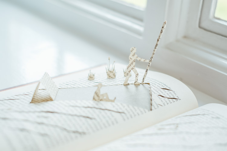 Paper Cut Books Art Display Decor Rural Handfasting Village Hall Wedding http://www.annapumerphotography.com/