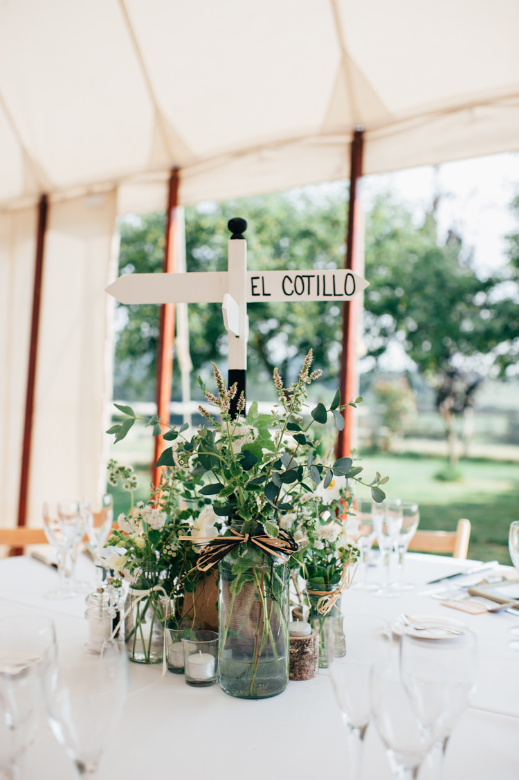 Centrepiece Flowers Jars Decor Sign Post Travel Place Seaside Country Farm Pale Blue Marquee Wedding http://loveandadventures.co.uk/