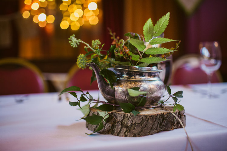 Tea Pot Foliage Centrepiece Decor Log Relaxed Autumnal Child Friendly Wedding http://kathrynedwardsphotography.com/
