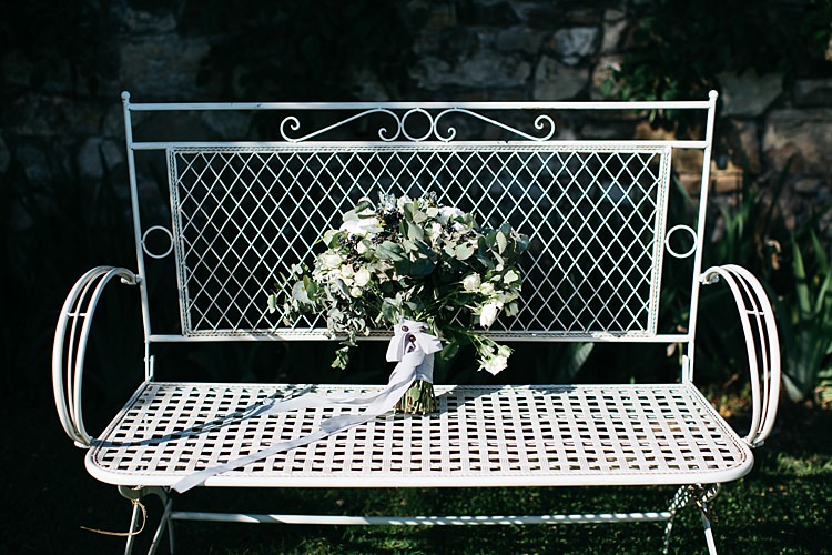 Bride Bouquet White Roses Greenery Long Ribbon White Chair Garden Rustic Chic Greenery Wedding Ideas in Tuscany http://www.tastino0.it/