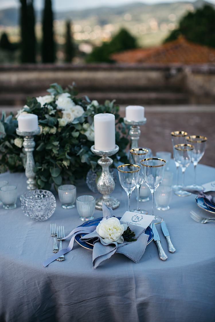 Reception Table Setting White Roses Greenery Silver Candlesticks White Black Stationery Calligraphy Fresh White Flower Silver Cutlery Rustic Chic Greenery Wedding Ideas in Tuscany http://www.tastino0.it/