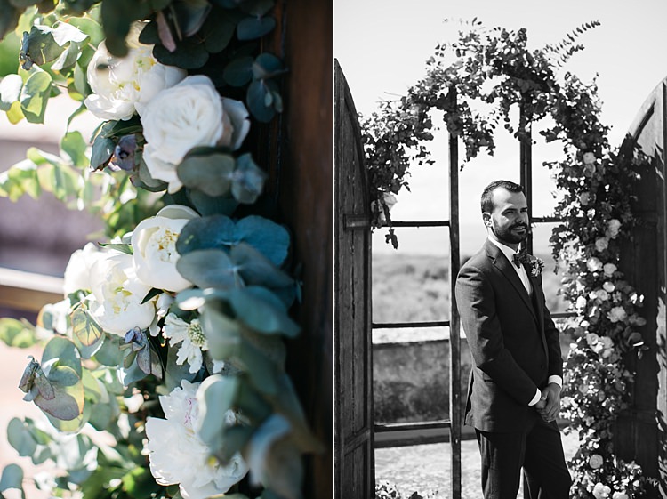 Outdoor Ceremony Groom Charcoal Pinstripe Suit Green Patterned Bowtie Wooden Archway White Roses Greenery Rustic Chic Greenery Wedding Ideas in Tuscany http://www.tastino0.it/