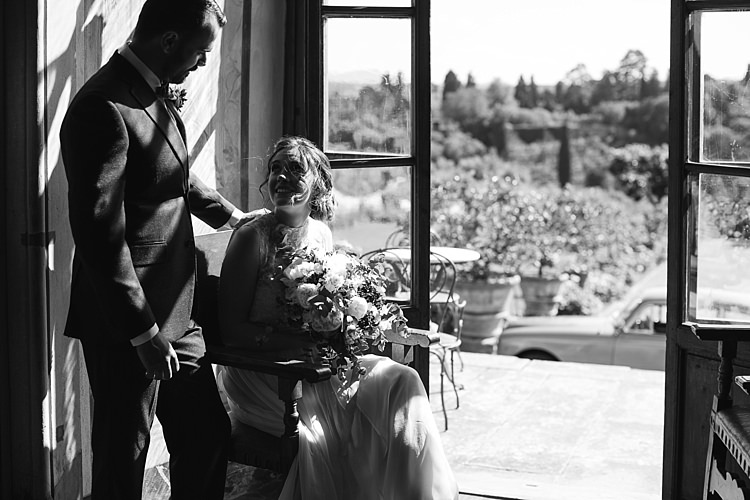 Bride High Neck Lace Tulle Bridal Gown Bouquet White Roses Greenery Groom Charcoal Pinstripe Suit Green Patterned Bowtie House Entrance Vintage Car Rustic Chic Greenery Wedding Ideas in Tuscany http://www.tastino0.it/