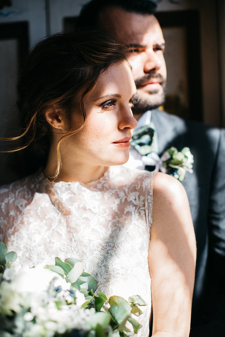 Bride High Neck Lace Tulle Bridal Gown Bouquet White Roses Greenery Groom Charcoal Pinstripe Suit Green Patterned Bowtie Shadows Bride High Neck Lace Tulle Bridal Gown Bouquet White Roses Greenery Groom Charcoal Pinstripe Suit Green Patterned Bowtie Shadows Rustic Chic Greenery Wedding Ideas in Tuscany http://www.tastino0.it/