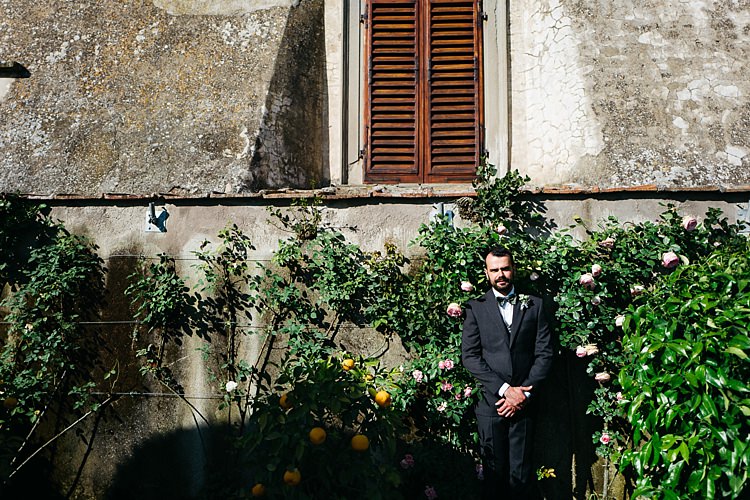 Groom Charcoal Pinstripe Suit Green Patterned Bowtie Florals Green Bushes Rustic Chic Greenery Wedding Ideas in Tuscany http://www.tastino0.it/