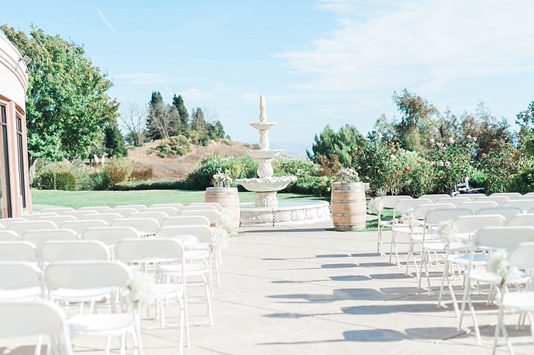 Outdoor Ceremony Grand Water Fountain White Chairs Barrel Tables Florals Grass Trees Soft Blush Sage Green Wedding California http://julia-rosephotography.com/