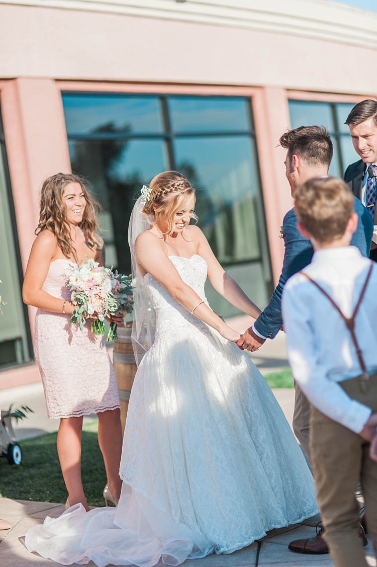 Outdoor Ceremony Bride Lace Sweetheart Strapless Bridal Gown Veil Gypsophila Groom Navy Jacket Bridesmaid Blush Strapless Dress Bouquet Celebrant Soft Blush Sage Green Wedding California http://julia-rosephotography.com/