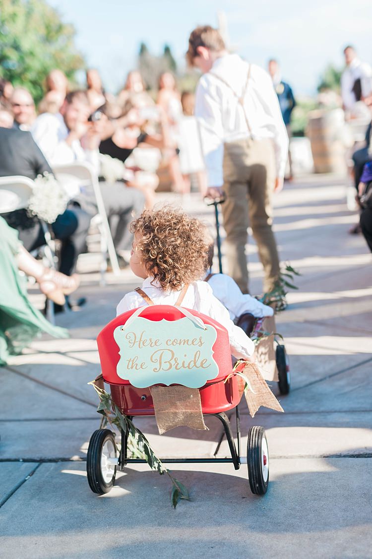 Outdoor Ceremony Page Boy Decorated Cart Here Comes The Bride Sign Guests Soft Blush Sage Green Wedding California http://julia-rosephotography.com/