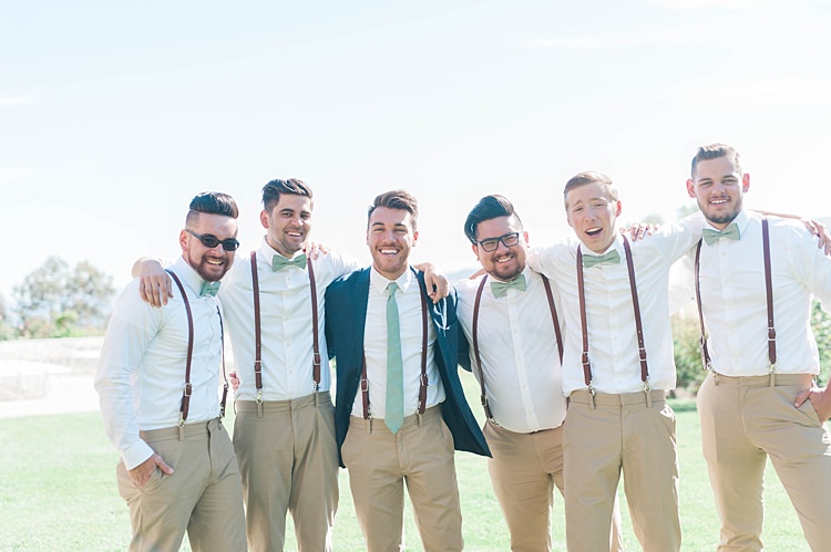Groom Navy Jacket Beige Pants Light Green Tie Groomsmen White Shirt Green Bowtie Leather Suspenders Beige Pants Soft Blush Sage Green Wedding California http://julia-rosephotography.com/