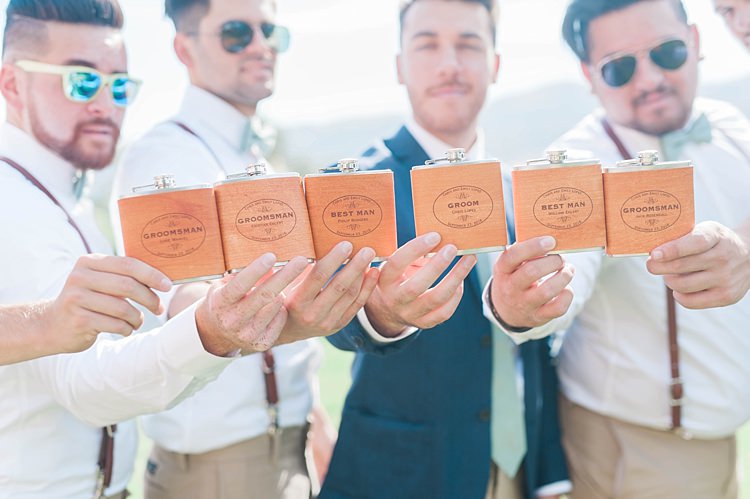 Personalised Hip Flasks Groom Navy Jacket Light Green Tie Groomsmen White Shirts Green Bowties Leather Suspenders Sunglasses Soft Blush Sage Green Wedding California http://julia-rosephotography.com/