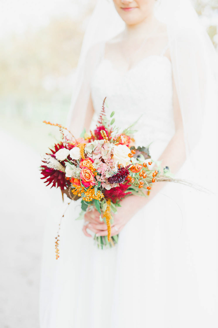 Bouquet Flowers Red Orange Dahlia Rose Bride Bridal Berry Magical Fairy Lit Autumn Barn Wedding http://whitestagweddings.com/