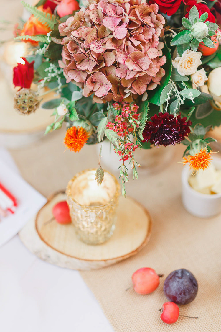 Table Decor Centrepiece Fruit Log Hessian Flowers Red Orange Dahlia Rose Berry Magical Fairy Lit Autumn Barn Wedding http://whitestagweddings.com/