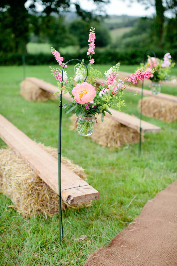 Aisle Pew End Flowers Hooks Peonies Peony Hay Bales Outdoor Colourful Pastel Home Made Farm Wedding http://helencawtephotography.com/