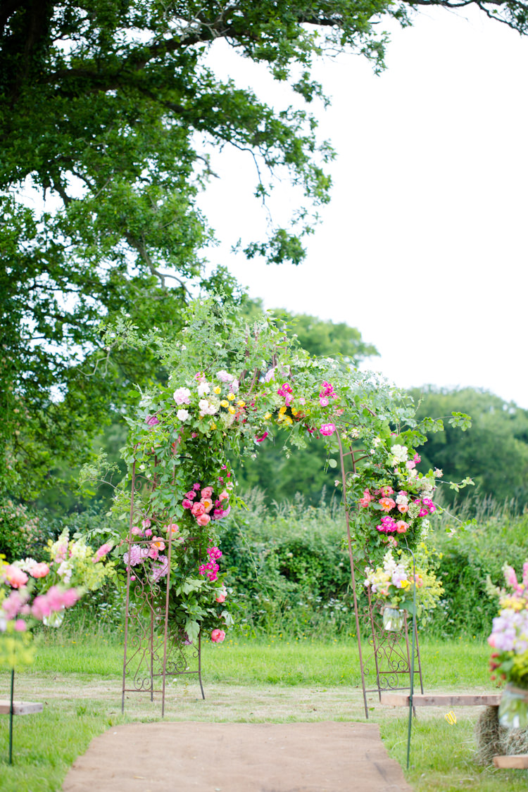 Flower Floral Arch Backdrop Outdoor Ceremony Colourful Pastel Home Made Farm Wedding http://helencawtephotography.com/