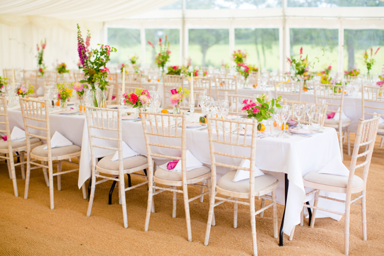 Flowers Long Tables Marquee Colourful Pastel Home Made Farm Wedding http://helencawtephotography.com/