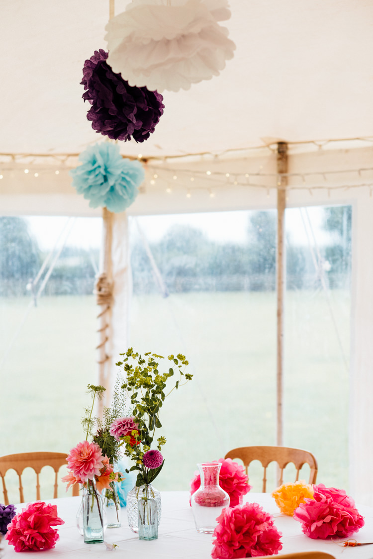 Marquee Pom Poms Dahlia Flowers Bottles Centrepiece Decor Multicoloured Home Made Glamping Wedding http://www.michellewoodphotographer.com/