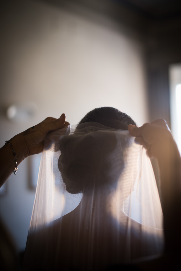 Bride Soft Bun Hairstyle Veil Romantic Outdoor Castle Tuscany Wedding http://www.natalymontanari.com/