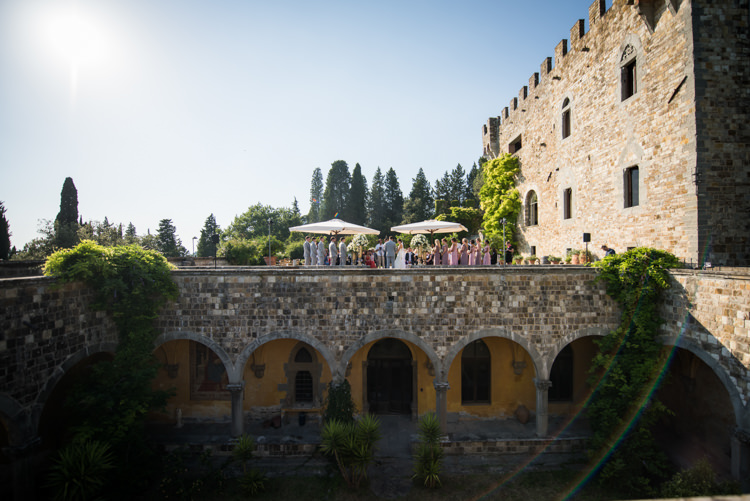 Outdoor Ceremony Large Umbrellas Guests Greenery Trees Romantic Outdoor Castle Tuscany Wedding http://www.natalymontanari.com/