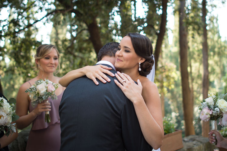 Outdoor Ceremony Bride Groom Embrace Bridesmaid Soft Purple Dress Bouquet Romantic Outdoor Castle Tuscany Wedding http://www.natalymontanari.com/