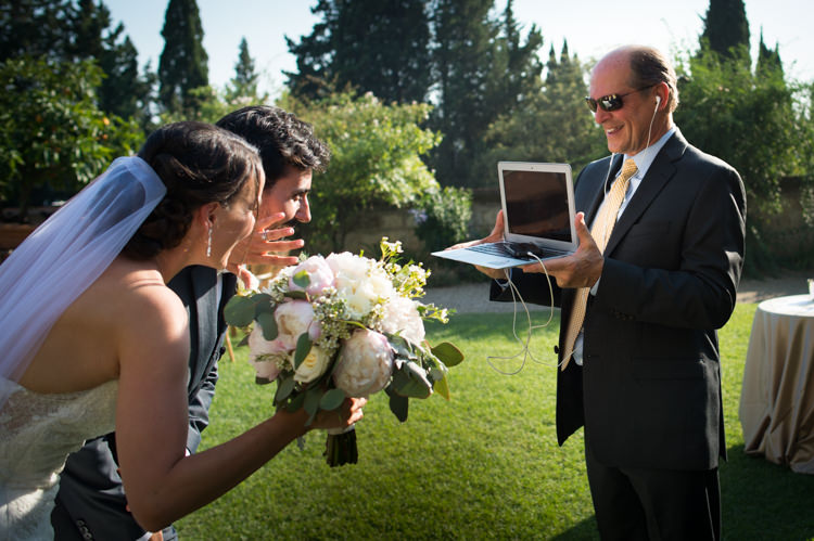 Outdoor Ceremony Bride Fitted Lace Mermaid Bridal Gown Veil Bouquet White Pink Rose Peony Florals Groom Black Suit Video Chat Romantic Outdoor Castle Tuscany Wedding http://www.natalymontanari.com/
