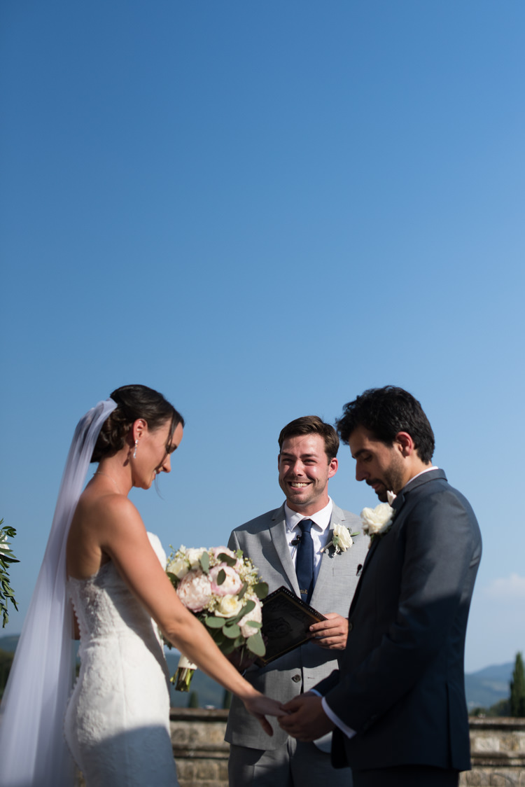 Outdoor Ceremony Bride Lace Fitted Mermaid Bridal Gown Veil Bouquet White Pink Rose Peony Florals Groom Black Suit White Bowtie Floral Buttonhole Celebrant Romantic Outdoor Castle Tuscany Wedding http://www.natalymontanari.com/