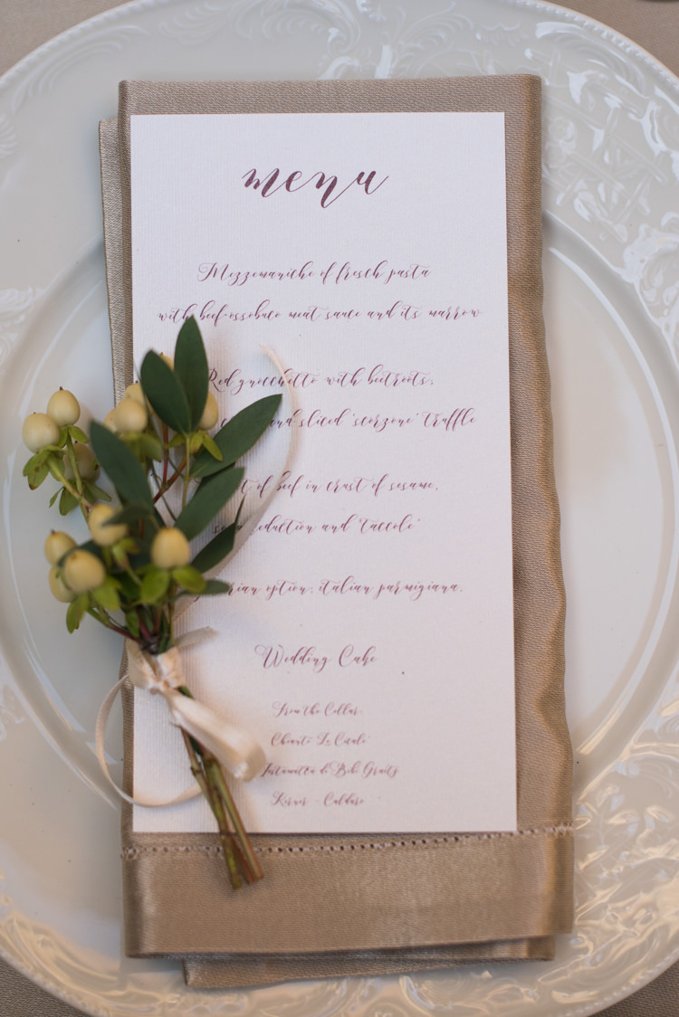 Reception Table Setting Menu Calligraphy Metallic Napkin Fresh Greenery Patterned Plate Romantic Outdoor Castle Tuscany Wedding http://www.natalymontanari.com/
