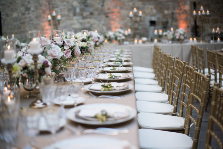 Reception Table Setting Fresh White Pink Purple Florals Roses Peonies Daisies Gold Candlesticks Gold Chairs Romantic Outdoor Castle Tuscany Wedding http://www.natalymontanari.com/