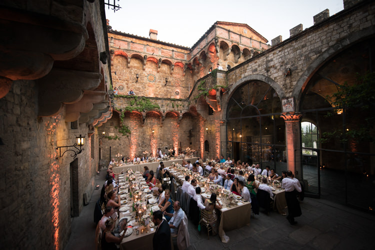 Reception Table Settings Gold Chairs Candlesticks Guests Sunset Romantic Outdoor Castle Tuscany Wedding http://www.natalymontanari.com/
