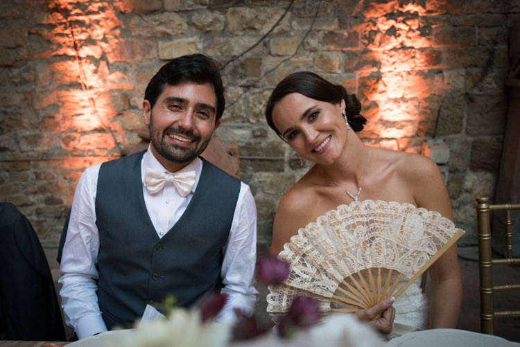 Reception Bride Fitted Lace Mermaid Bridal Gown Crystal Earrings Necklace Lace Fan Groom Black Vest White Shirt White Bowtie Romantic Outdoor Castle Tuscany Wedding http://www.natalymontanari.com/