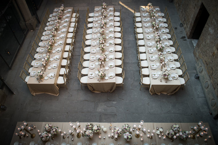 Reception Table Setting Candles Fresh Florals Metallic Gold Chairs Romantic Outdoor Castle Tuscany Wedding http://www.natalymontanari.com/