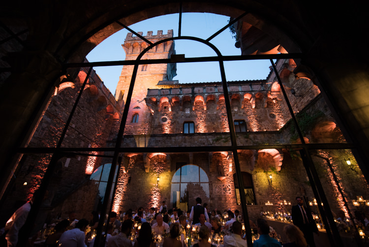 Reception Guests Candlelight Sunset Large Window Romantic Outdoor Castle Tuscany Wedding http://www.natalymontanari.com/