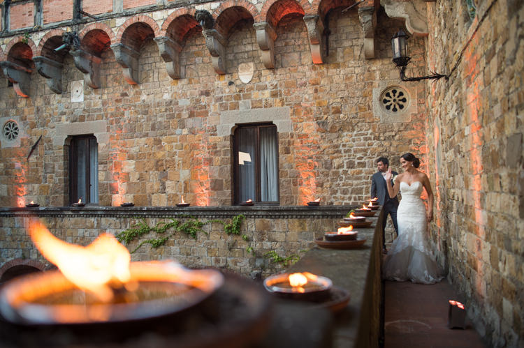 Outdoor Reception Bride Fitted Lace Mermaid Bridal Gown Groom Black Suit Candles Romantic Outdoor Castle Tuscany Wedding http://www.natalymontanari.com/