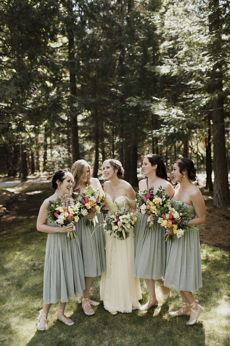Bride Sarah Seven Cascade Off The Shoulder Lace Bridal Gown Bridesmaids Green Strapless Dresses Ballet Slippers Ribbons Multicoloured Bouquets Whimsical Forest Harry Potter Wedding http://heatherelizabethphotography.com/