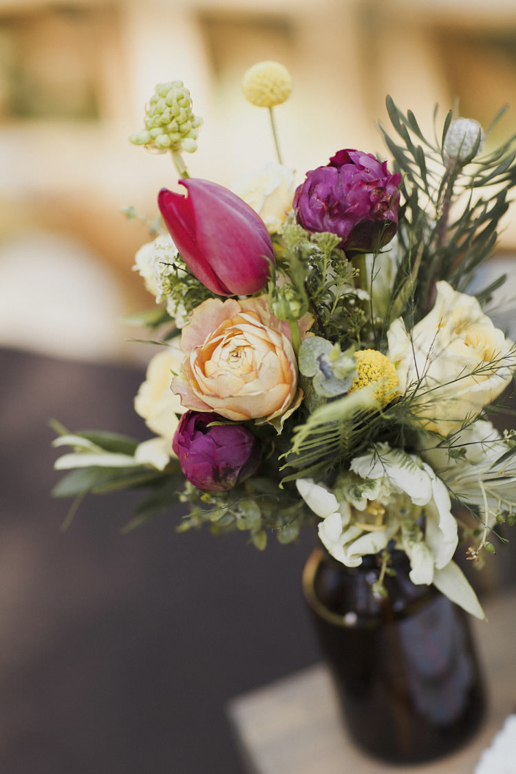 Dark Bottle Multicoloured Florals Pink Cream Yellow Orange Roses Lilly Whimsical Forest Harry Potter Wedding http://heatherelizabethphotography.com/