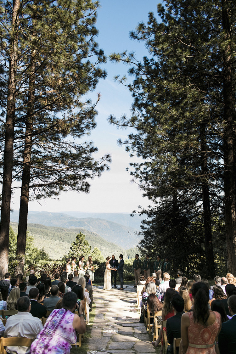 Outdoor Ceremony Bride Groom Bridal Party Guests Tall Trees Stones Whimsical Forest Harry Potter Wedding http://heatherelizabethphotography.com/