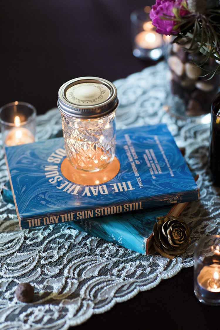 Reception Table Setting Book Lover Theme Books Candles Jars Lace Table Runner Multicoloured Florals Whimsical Forest Harry Potter Wedding http://heatherelizabethphotography.com/