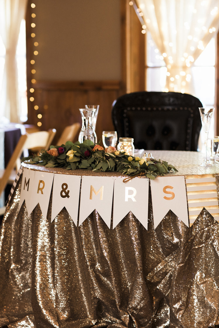 Reception Table Setting Bride Groom Table Metallic Sequin Tablecloth Mr Mrs Bunting Multicoloured Florals Greenery Vintage Chairs Whimsical Forest Harry Potter Wedding http://heatherelizabethphotography.com/