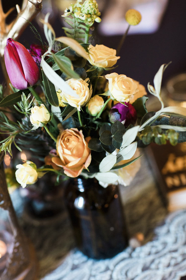 Reception Dark Bottle Multicoloured Florals Cream Orange Pink Roses Greenery Lace Table Runner Whimsical Forest Harry Potter Wedding http://heatherelizabethphotography.com/