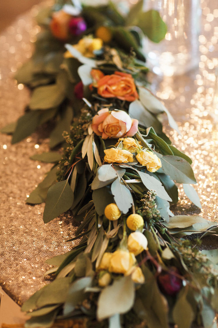 Reception Bride Groom Table Fresh Multicoloured Florals Greenery Metallic Sequin Tablecloth Whimsical Forest Harry Potter Wedding http://heatherelizabethphotography.com/