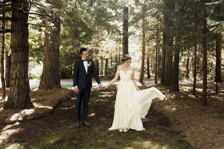 First Look Bride Sarah Seven Cascade Lace Off The Shoulder Bridal Gown Embellished Belt Crystal Hairpiece Groom Dark Blue Suit Patterned Bowtie Floral Buttonhole Whimsical Forest Harry Potter Wedding http://heatherelizabethphotography.com/