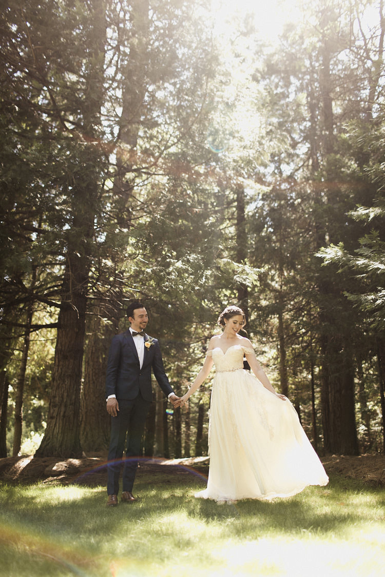 First Look Bride Sarah Seven Cascade Lace Off The Shoulder Bridal Gown Embellished Belt Crystal Hairpiece Groom Dark Blue Suit Patterned Bowtie Floral Buttonhole Whimsical Forest Harry Potter Wedding http://heatherelizabethphotography.com/