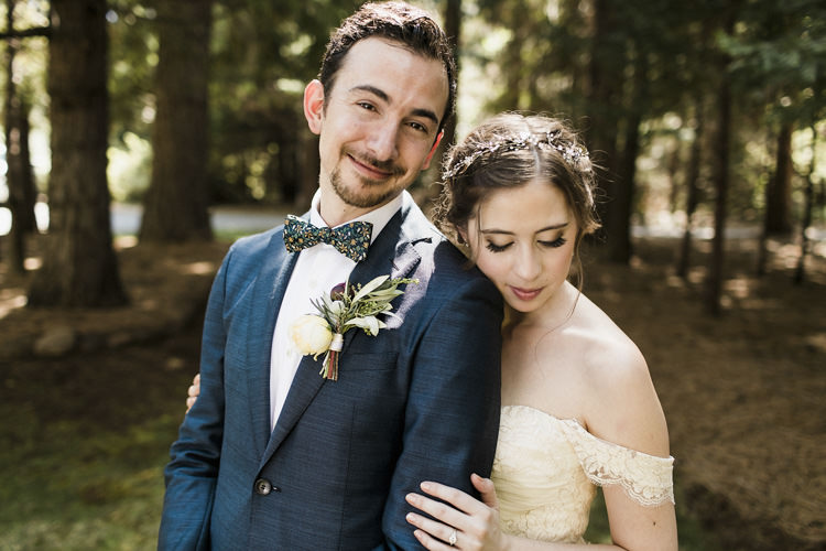 First Look Bride Sarah Seven Cascade Lace Off The Shoulder Bridal Gown Embellished Belt Crystal Hairpiece Groom Dark Blue Suit Patterned Bowtie Floral Buttonhole Whimsical Forest Harry Potter Wedding http://heatherelizabethphotography.com/