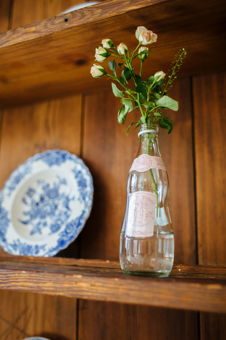 Bottle Flowers Dresser Enchanted English Country Garden Wedding Disney http://lauradebourdephotography.com/