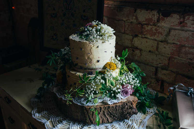 Buttercream Cake Flowers Log Stand Indie Outdoorsy Camp Wedding http://emilytylerphotography.com/