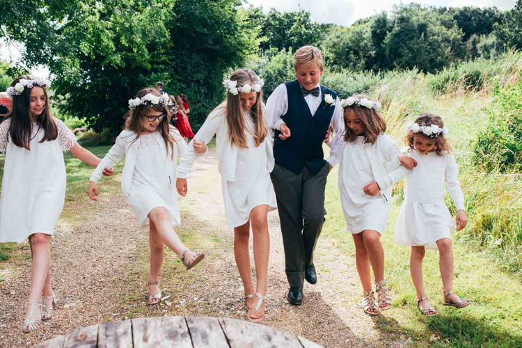 Flower Girls White Crochet Dresses Flower Crowns Page Boy Bow Tie Indie Outdoorsy Camp Wedding http://emilytylerphotography.com/