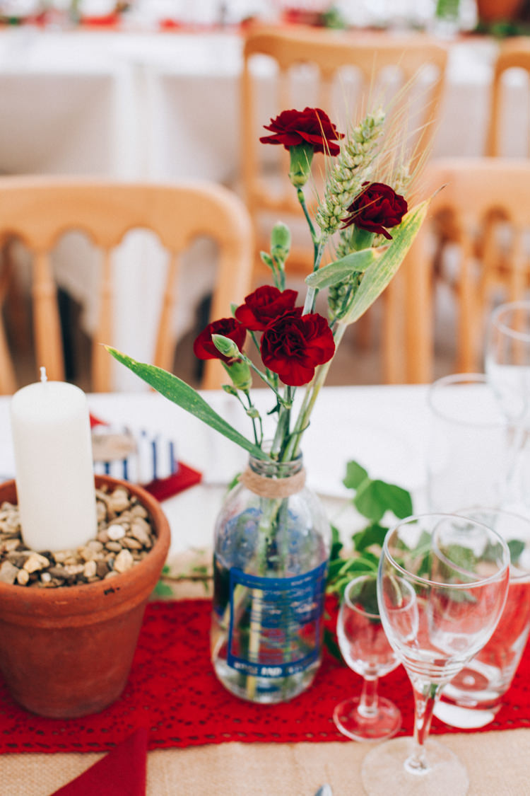 Red Flowers Wheat Bottle Centrepiece Decor Hand Made Red White Blue Farm Wedding http://www.caseyavenue.co.uk/