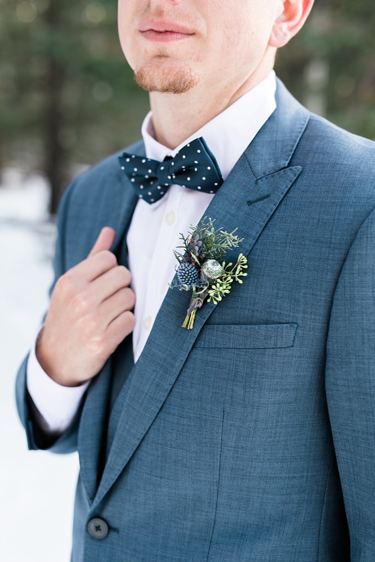 Groom Blue Suit Vest Navy Polka Dot Bowtie Floral Buttonhole Snowy Winter Wonderland Anniversary Shoot http://ryannlindseyphotography.com/