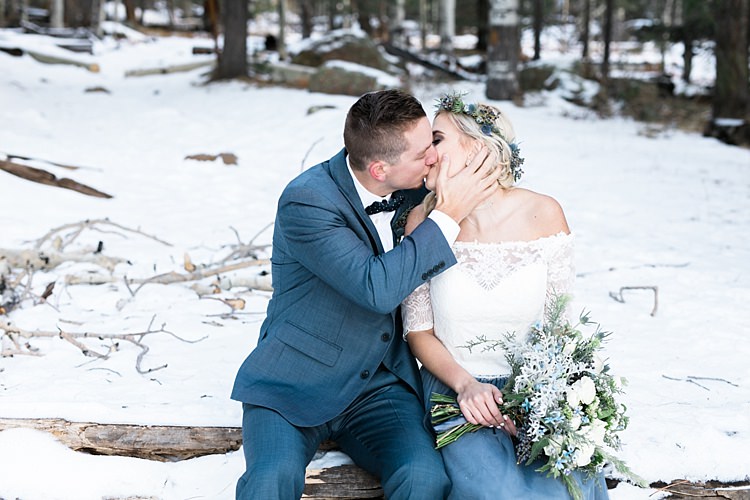 Bride Lace Off The Shoulder Top Blue Long Skirt Floral Crown Bouquet White Blue Green Flowers Groom Blue Suit Navy Polka Dot Bowtie Snowy Winter Wonderland Anniversary Shoot http://ryannlindseyphotography.com/