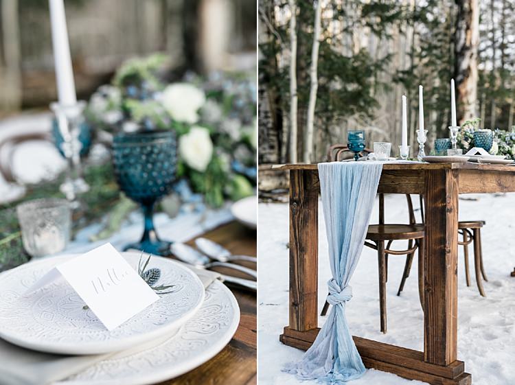 Outdoor Reception Wooden Table Blue Grey Fabric Fresh White Blue Green Florals Blue Wine Goblets Candlesticks Snowy Winter Wonderland Anniversary Shoot http://ryannlindseyphotography.com/